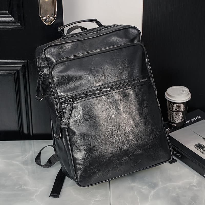 Couro genuíno de grande capacidade versão coreana mochila de bagagem de viagem masculina bolsa escolar de couro bolsa de