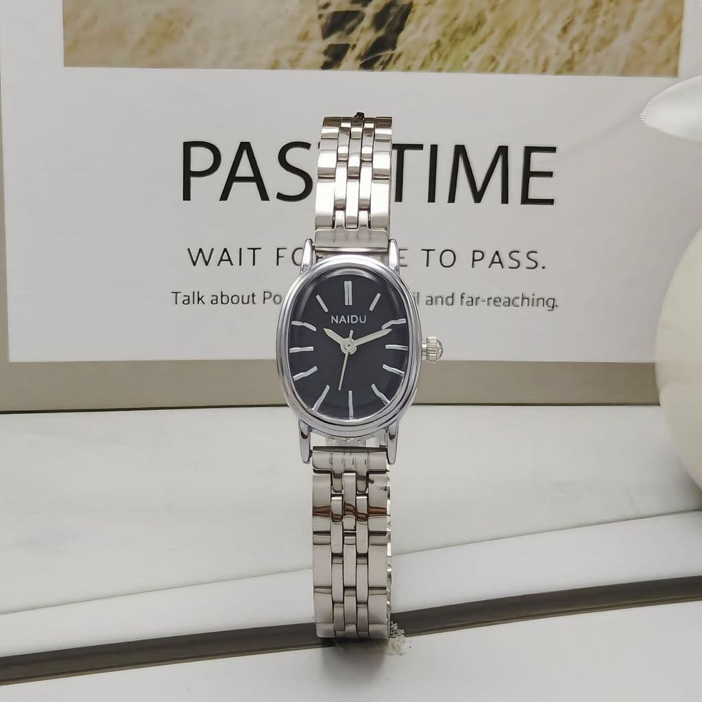 Novo relógio feminino NAIDU com mostrador oval e pulseira de aço, relógio feminino de nicho com marcadores em relevo, re