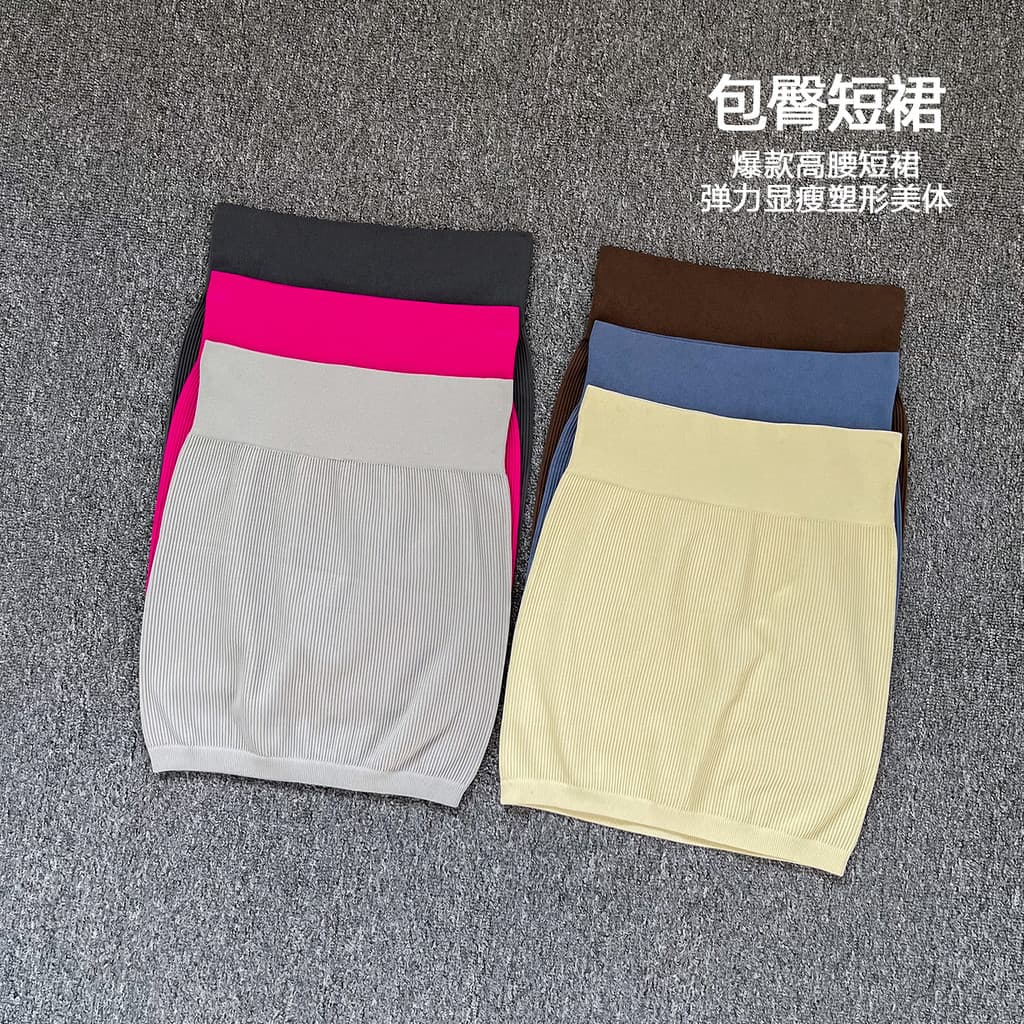 Simples moda de cintura alta malha Hip-coberto saia curta feminina primavera outono 2026 novo estilo saia de lã grossa f