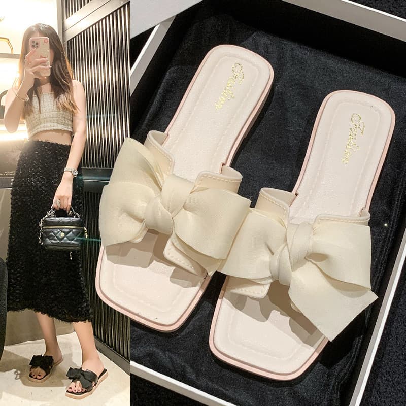 Chinelos de uso exterior feminino verão 2026 moda plana Bowknot sapatos femininos elegante sola macia confortável Flip-F