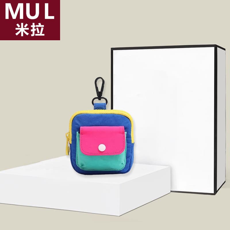 Japão Mira MUL bolsa de moedas portátil 2026 novo estilo nicho Design pequeno titular do cartão Mini zíper fone de ouvid