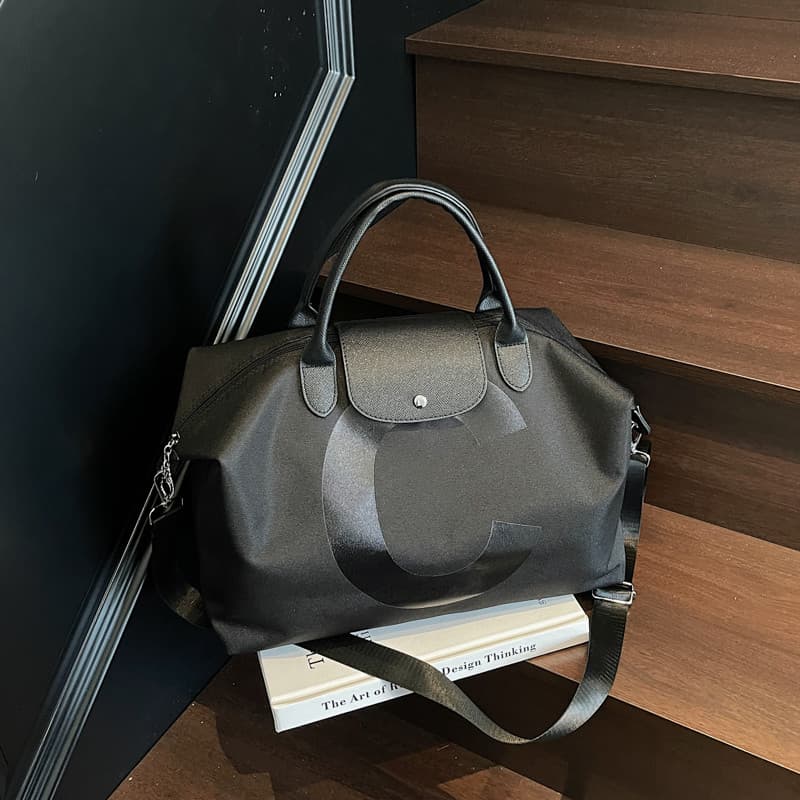 Bolsa de viagem de grande capacidade 2026 novo estilo bolsa de bagagem de curta distância feminina Commuter portátil via