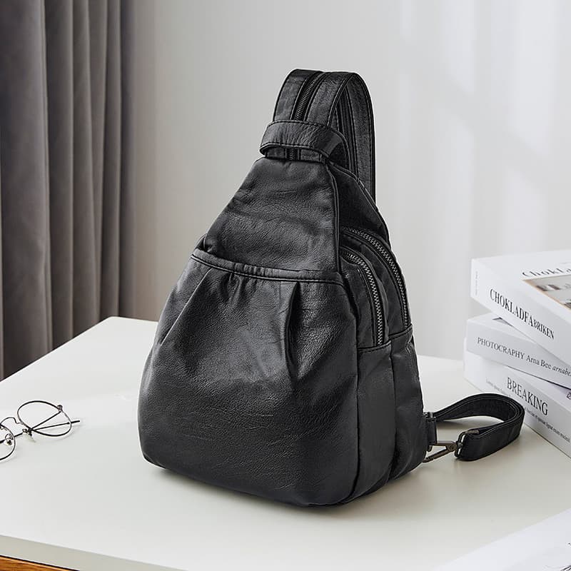 Mochila feminina 2026 novo estilo verão versão coreana bolsa escolar de couro bolsa de peito de pele de carneiro couro m