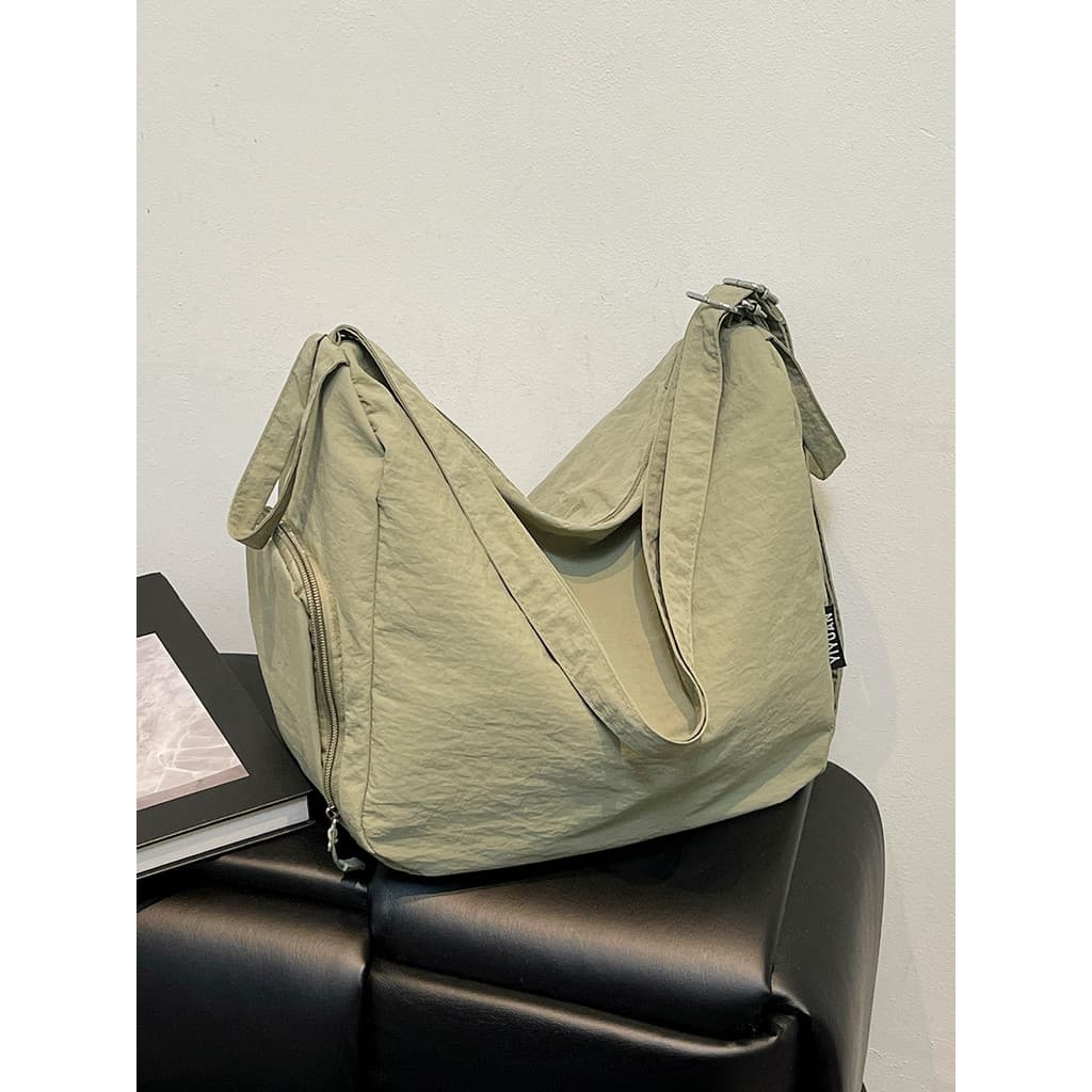 Mochila multifuncional de grande capacidade feminina 2026 novo estilo estudante universitário bolsa mensageiro de um omb