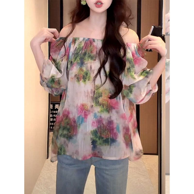 Estilo de férias Floral camisa de manga curta feminina 2026 verão novo estilo manga bufante camisa pequena redução de id