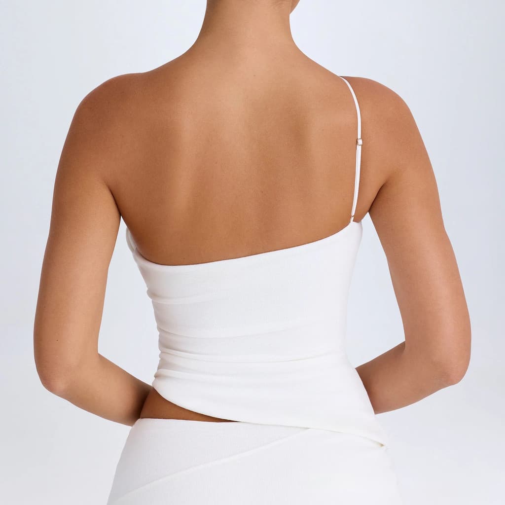 Design exclusivo para fitness com recorte em um dos ombros, roupa de yoga de secagem rápida com almofadas de peito embut