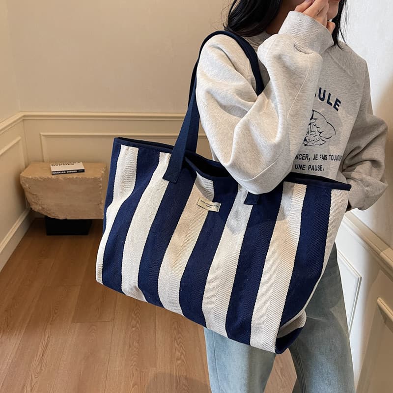 2026 novo estilo listrado bolsa de lona feminina grande capacidade Commuter sacola masculina bolsa de compras bolsa de o