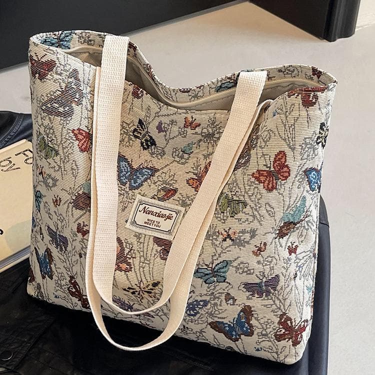 Bolsa de lona borboleta de grande capacidade 2026 novo estilo Commuter sacola feminina ins moda passeio de um ombro mamã
