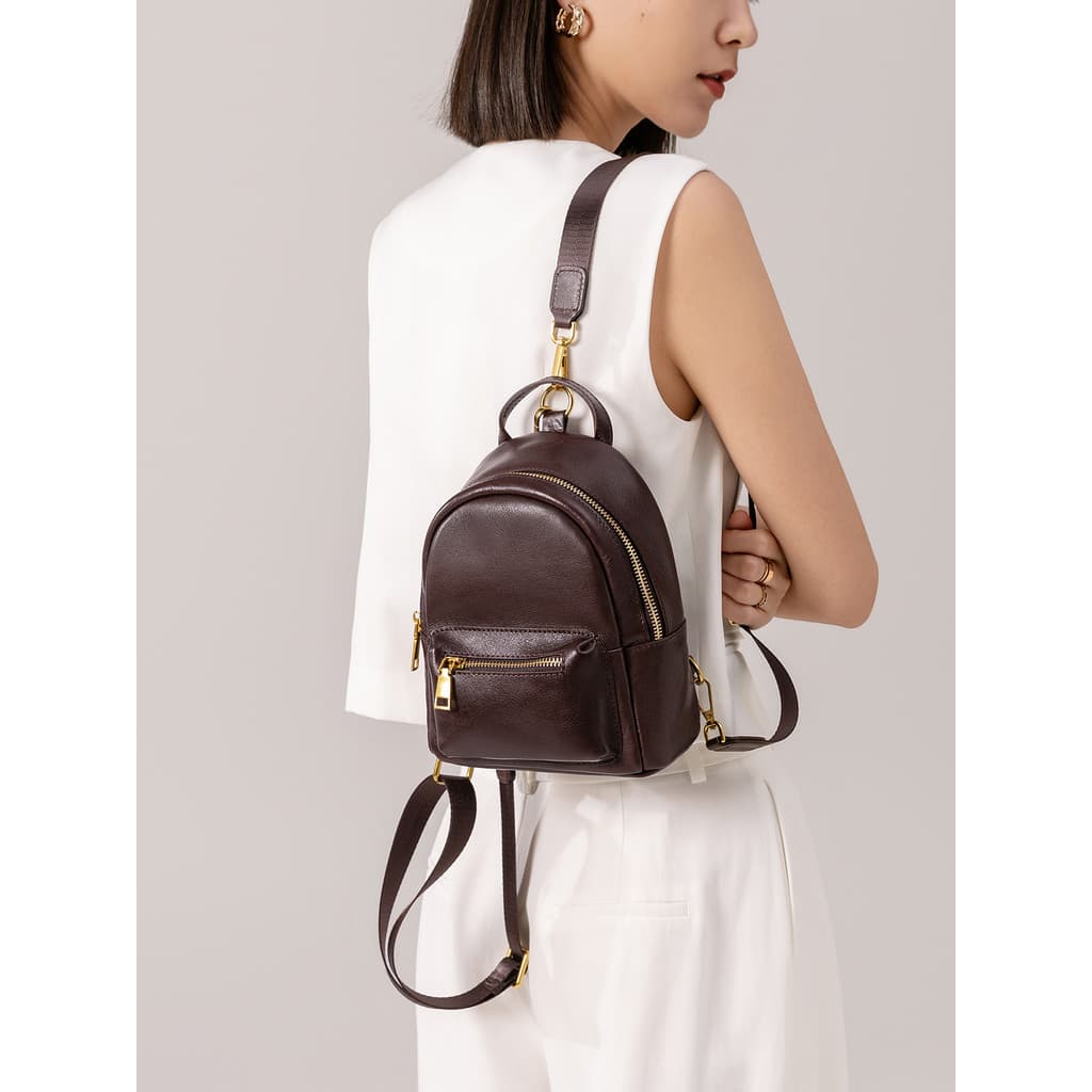 Mochila de couro feminina 2026 novo estilo leve All-Match senhoras mochila pequena Mini Retro vegetal curtido primeira c