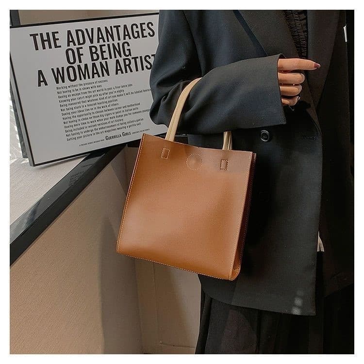 Popular bolsa feminina estilo Vertical 2025 novo estilo saco na moda lancheira Commuter saco grande capacidade portátil