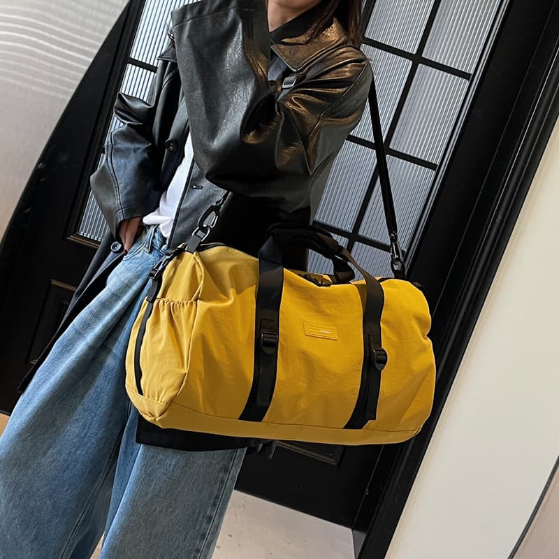 Bolsa de viagem de curta distância 2026 primavera grande capacidade mochila masculina feminina bolsa leve treinamento es