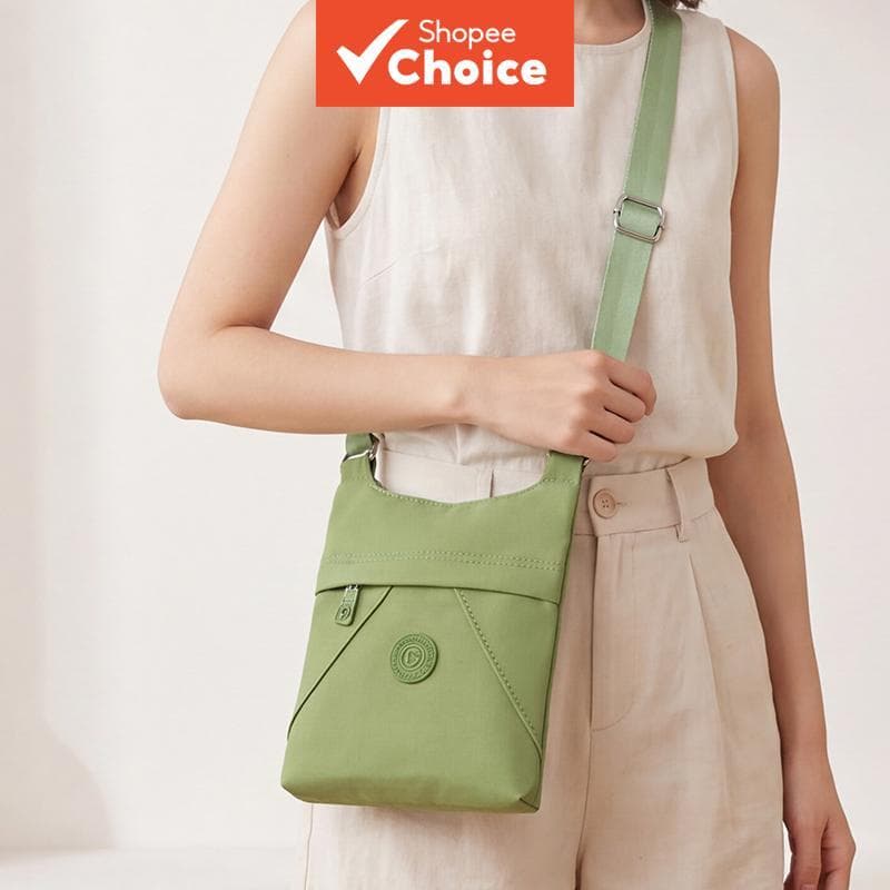 Bolsa tiracolo feminina pequena de nylon à prova d'água, alça larga ajustável, vários bolsos, leve