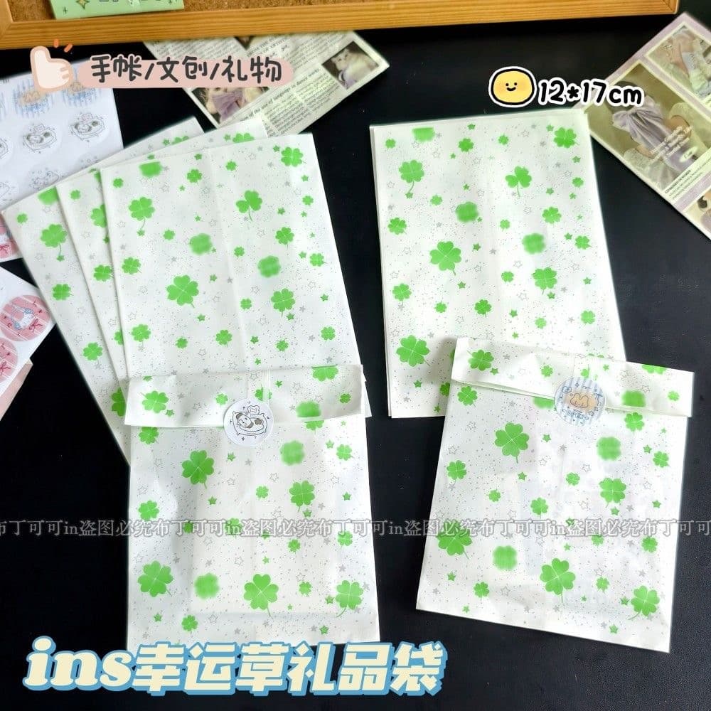 Ins estilo trevo de quatro folhas estrela saco de papel de alto valor pequeno cartão manual pequena embalagem de present