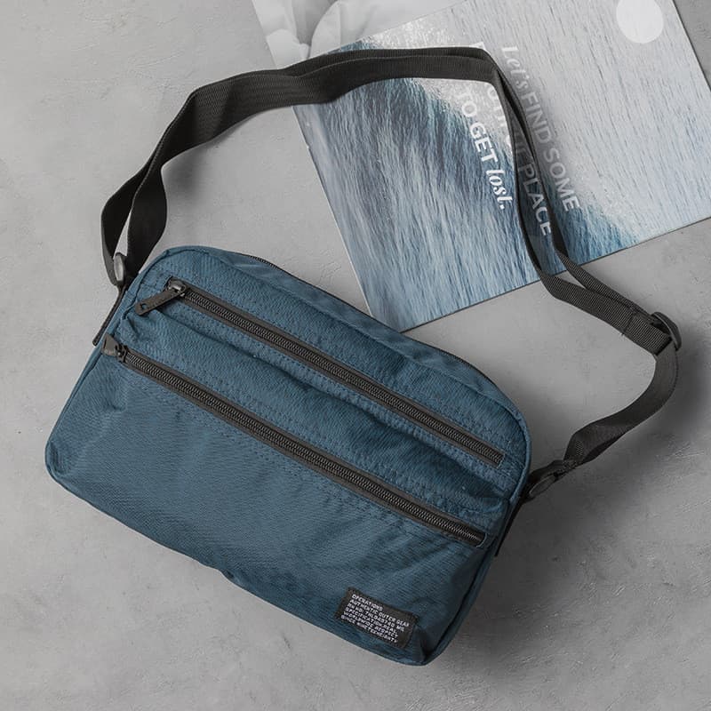 Bolsa de ombro masculina japonesa ins estilo Casual bolsa mensageiro única na moda versão coreana bolsa mensageiro estud