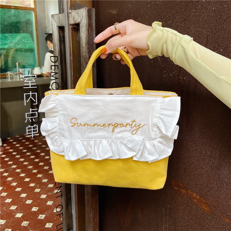 Estilo coreano chique doce babados bolsa bordado fresco bonito mão-transporte pequeno saco menina estudante pequeno saco