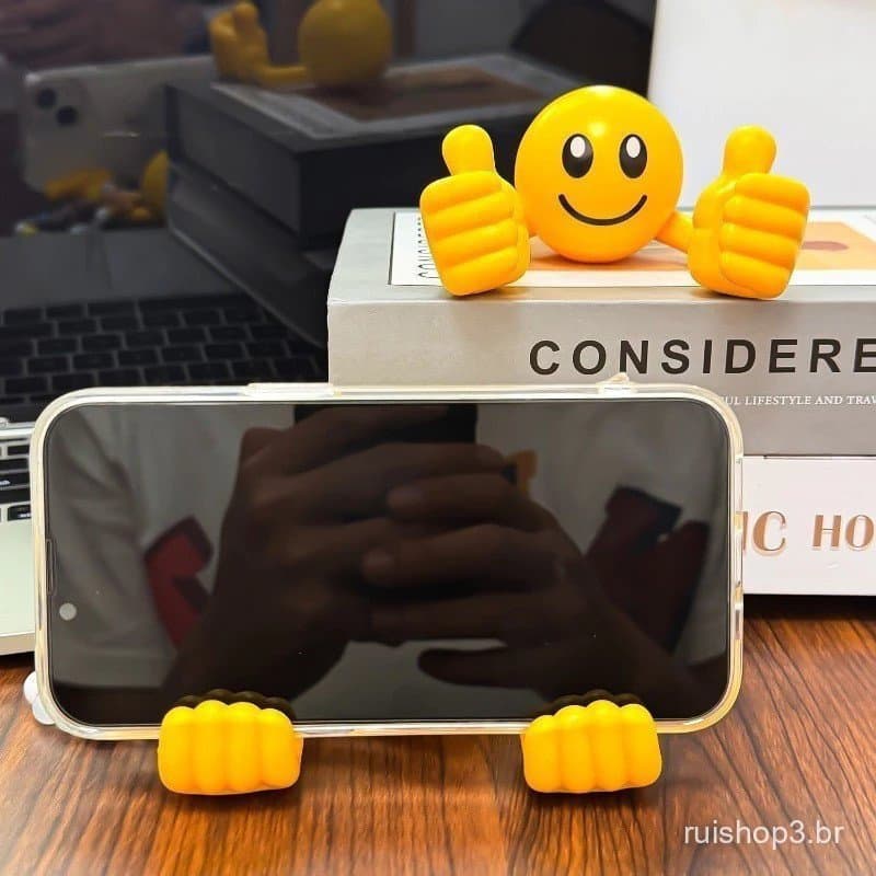 Suporte para celular para pessoas preguiçosas, com um organizador de mesa criativo em formato de polegar e um rosto sorr