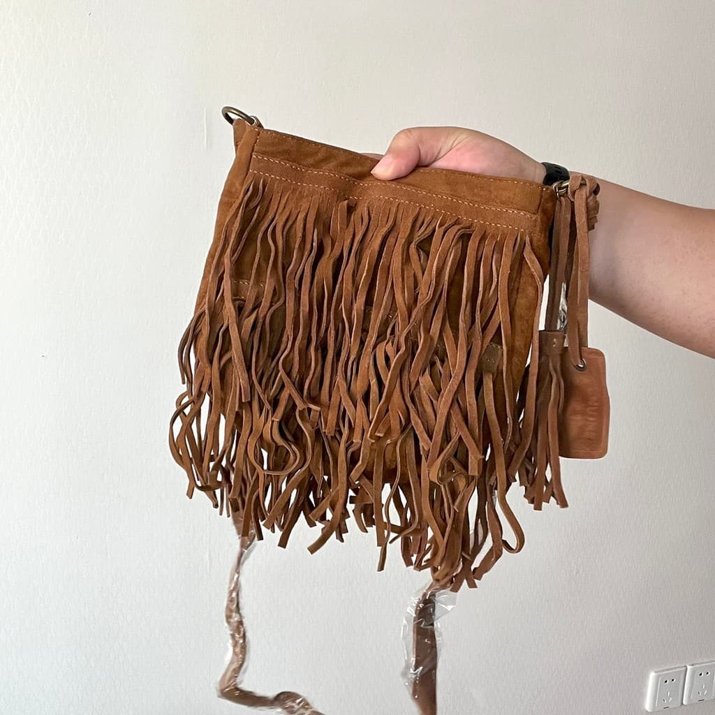 Couro de vaca dupla face longa borla um ombro mensageiro bolsa feminina ins estilo Denim Casual portátil pequeno saco ma