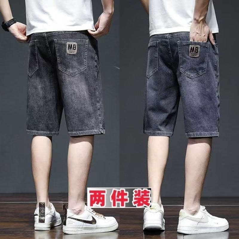 2026 estiramento Denim calças de cinco pontos masculino versão coreana na moda solto calças médias resistente ao desgast