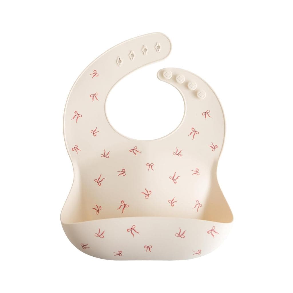 Babador de Silicone para Bebê Mushie |   Babadores Impermeáveis Ajustáveis (com Laços)