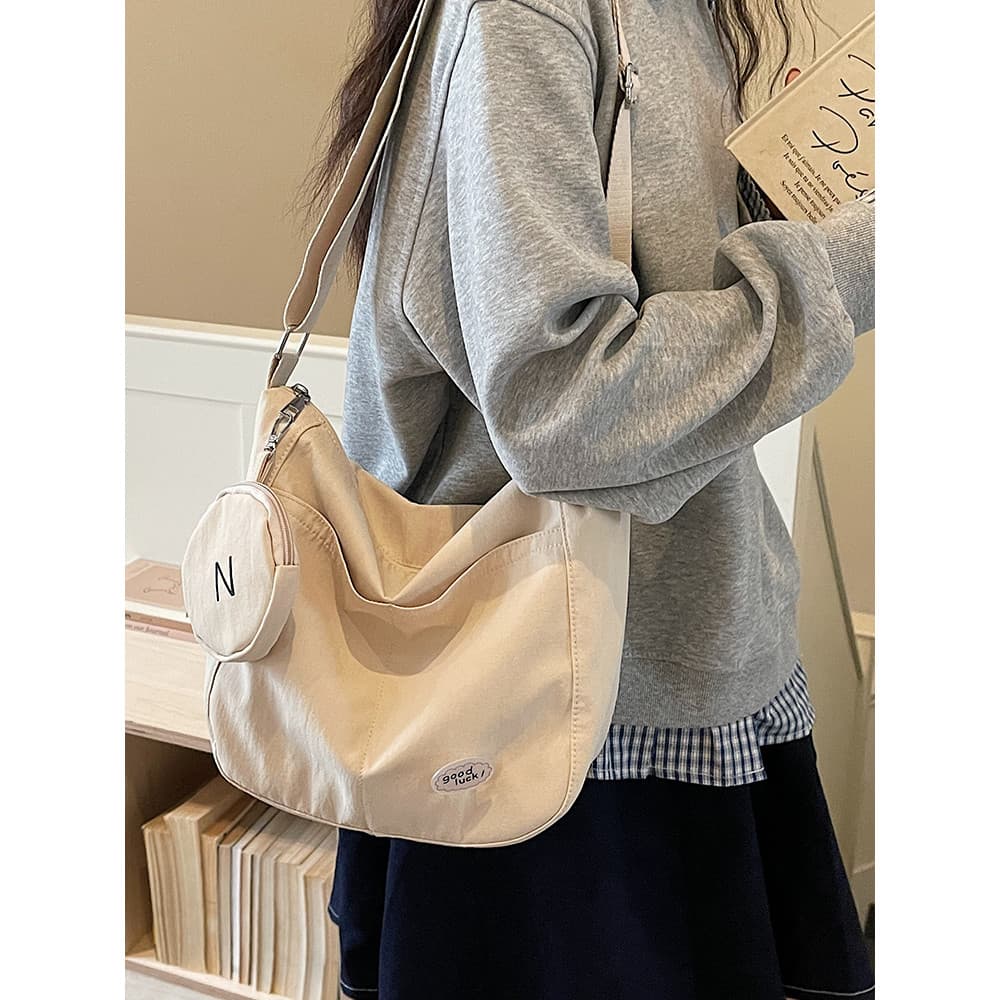 Simples Casual All-Match sacola feminina 2026 estudante classe Commuter grande capacidade saco do mensageiro solto bolsa