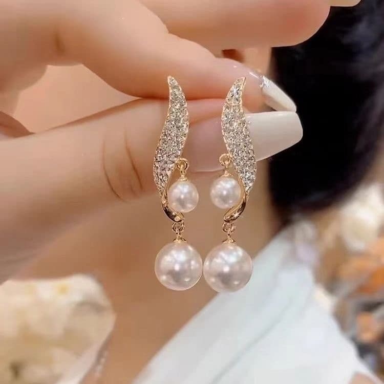 Moda brincos dourados pérola diamante Design brincos S925 agulha de prata High-End requintado brincos femininos