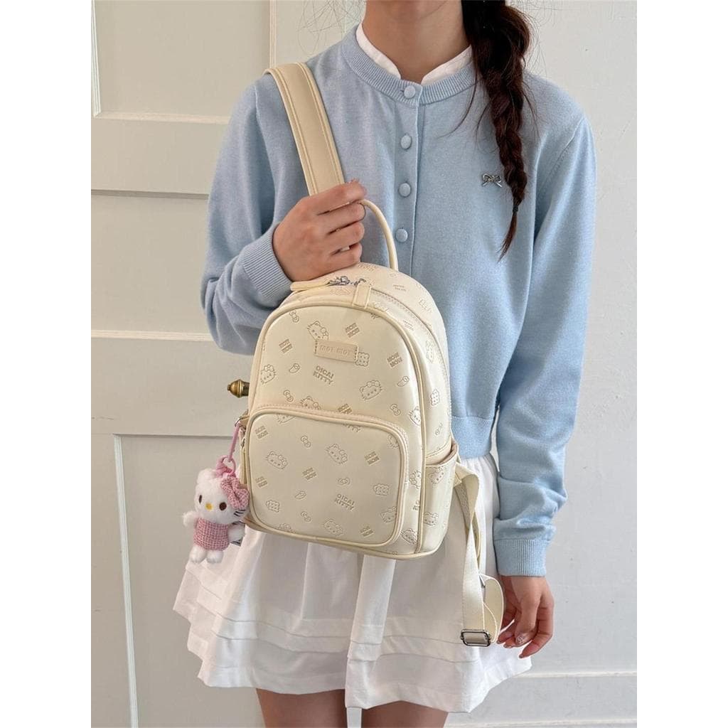Muzi rua dos desenhos animados mochila feminina 2026 novo estilo moda fresco Casual mochila diária All-Match pequena moc