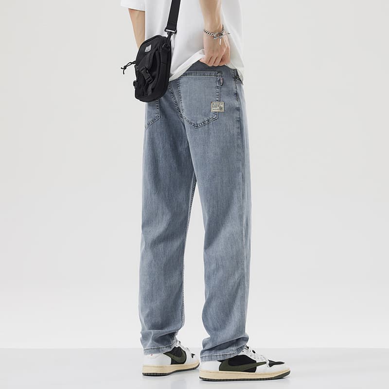 Jeans masculinos soltos perna reta 2025 estilo verão Tencel leve macio legal High-End na moda All-Match masculino diário