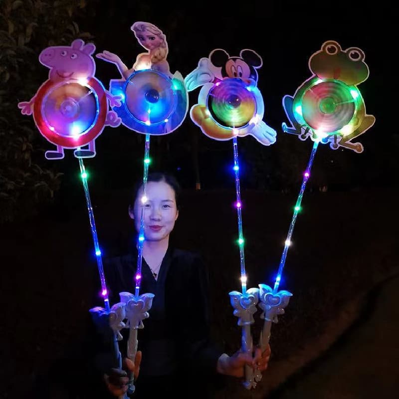 Moinho de vento brinquedos infantis lote ao ar livre influenciador de plástico colorido rotativo com música luminosa jar