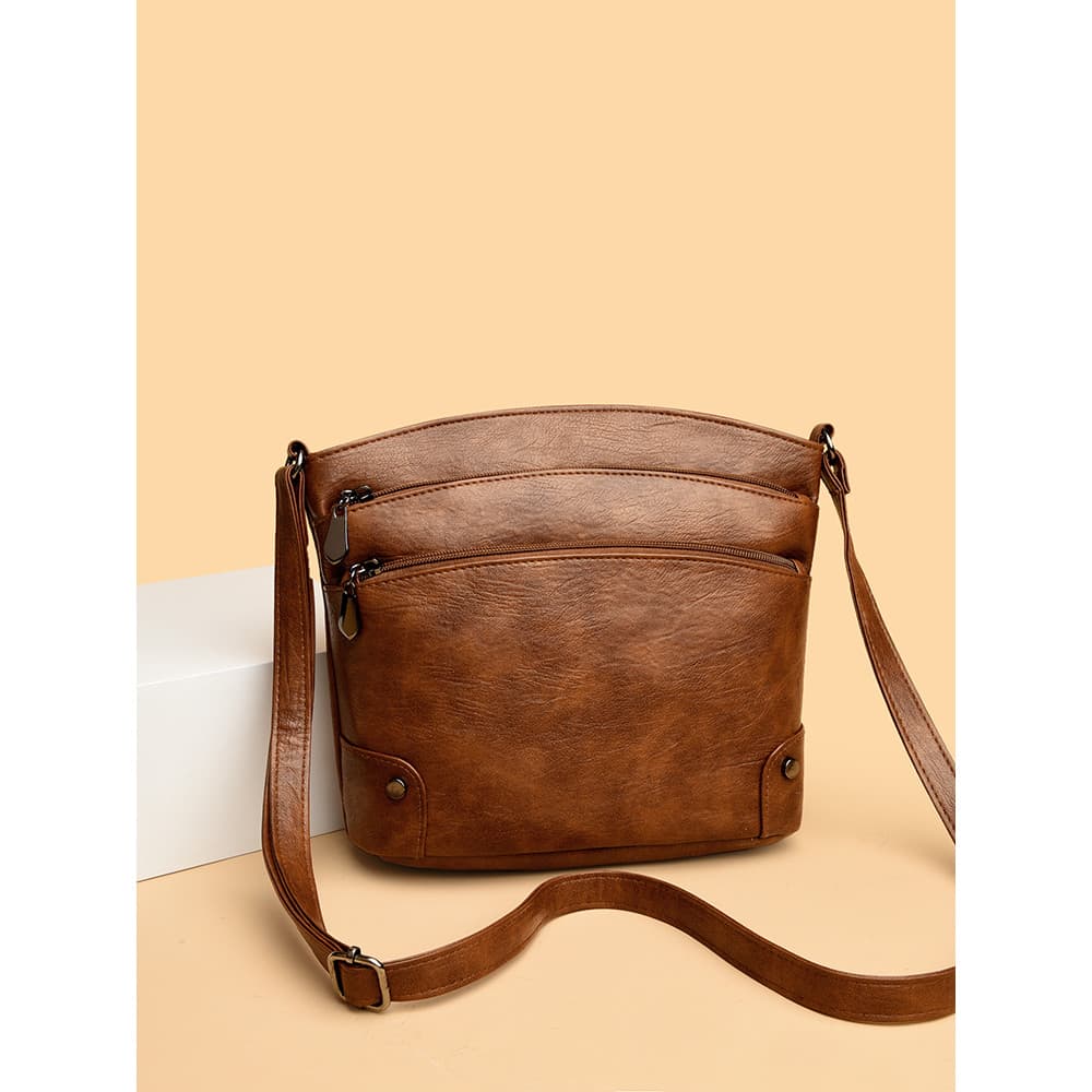 Bolsa feminina 2026 novo estilo Retro moda Multi-camada senhoras balde saco de couro macio mãe de meia-idade um ombro