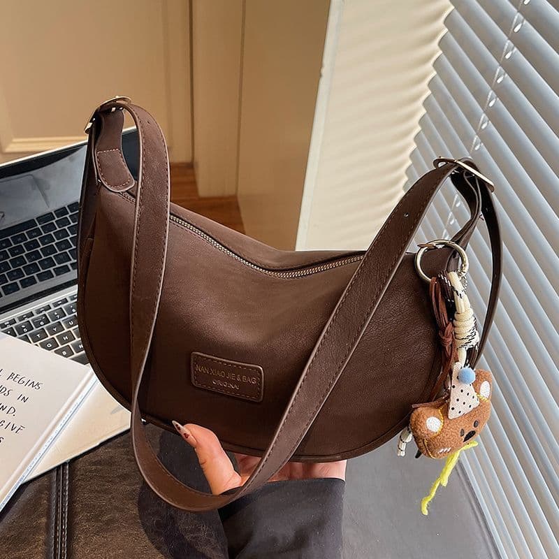 Bolsa de ombro e transversal feminina de alta qualidade e design exclusivo, estilo coreano 2026, elegante e versátil.