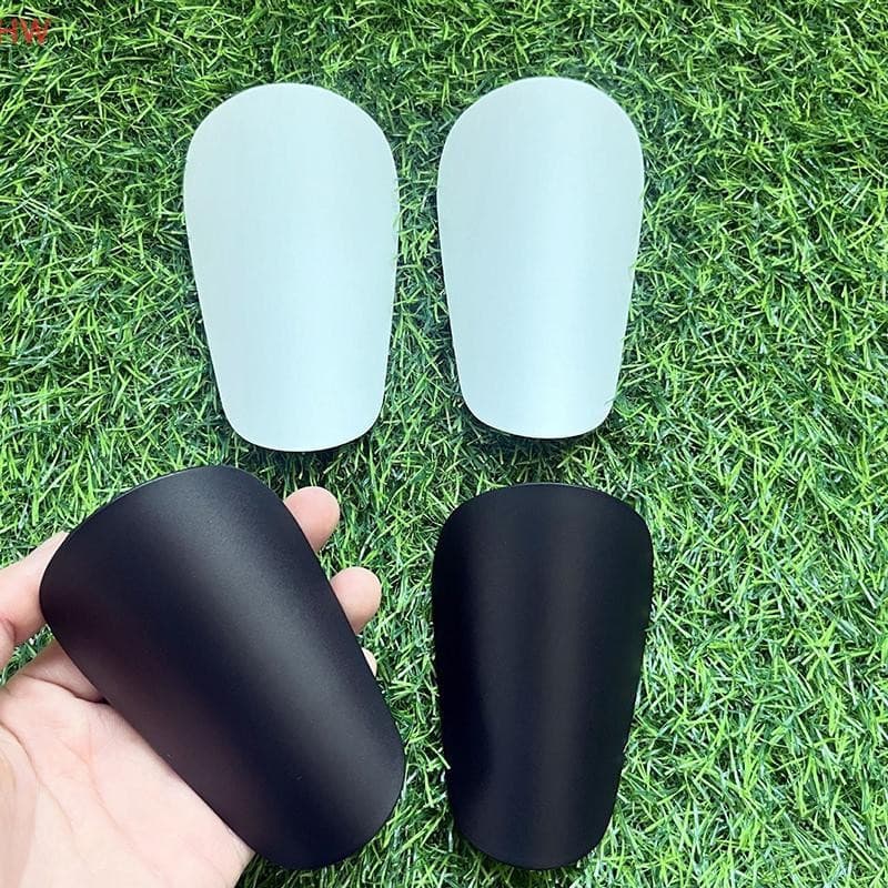 2 pares de mini caneleiras de futebol, protetores de canela resistentes ao desgaste e absorventes de impacto, caneleiras