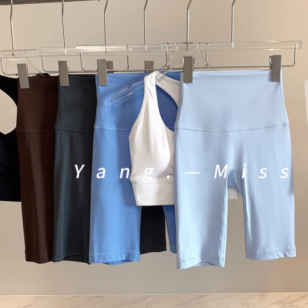 Calças de ioga de cinco pontos com tiras de abdômen ceroso macio feminino Leggings de levantamento de quadril de alta el