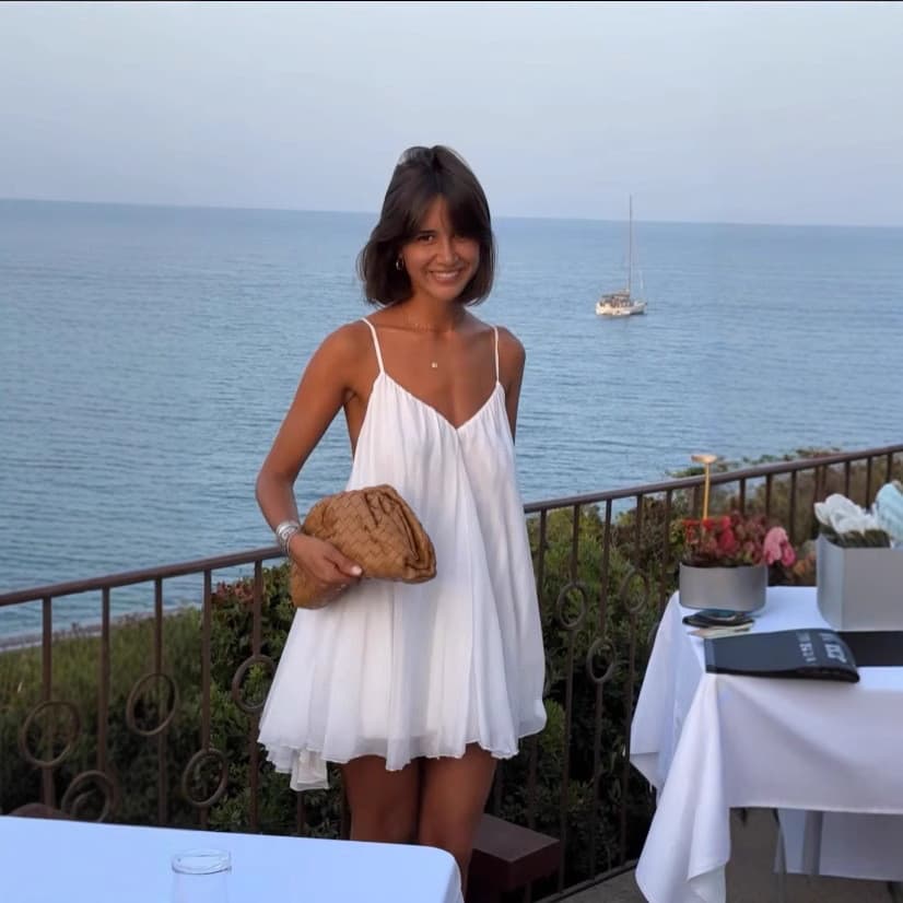 Novo estilo francês de férias à beira-mar elegante All-Match grande Halter Mini vestido estilingue