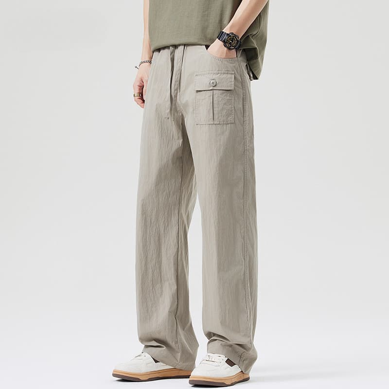 2025 primavera verão novo estilo de secagem rápida calças casuais masculinas soltas em linha reta na moda Multi-saco cal