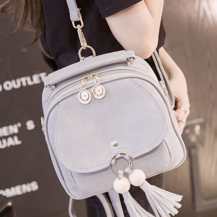 2026 novo estilo versão coreana pequena mochila feminina Mini Casual borla pequena mochila de três propósitos bolsa femi