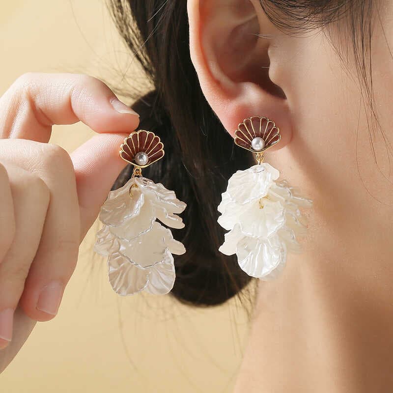 Novo estilo concha pétala brincos feminino moda elegante All-Match borla brincos feminino único luz luxo nicho orelha jó