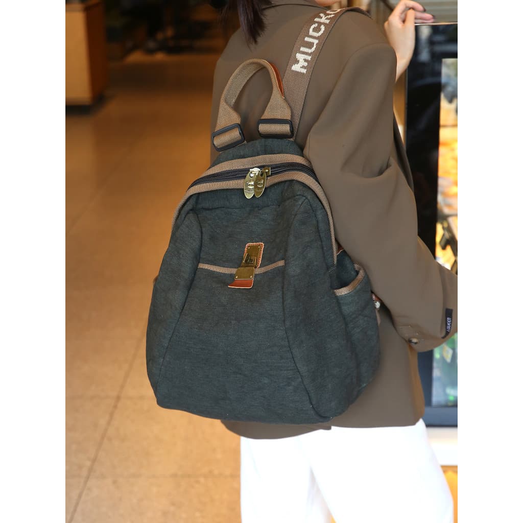 Retro lona mochila de grande capacidade feminina 2026 novo estilo Design elegante nicho mochila Commuter bolsa de ombro