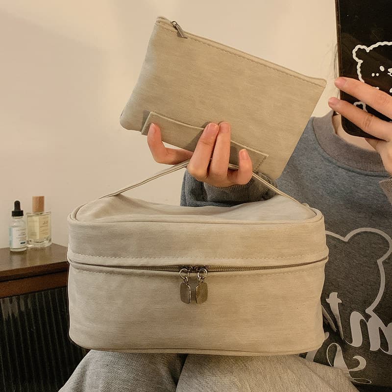 Saco cosmético feminino portátil de grande capacidade 2026 novo estilo High-End cuidados com a pele produto saco de arma