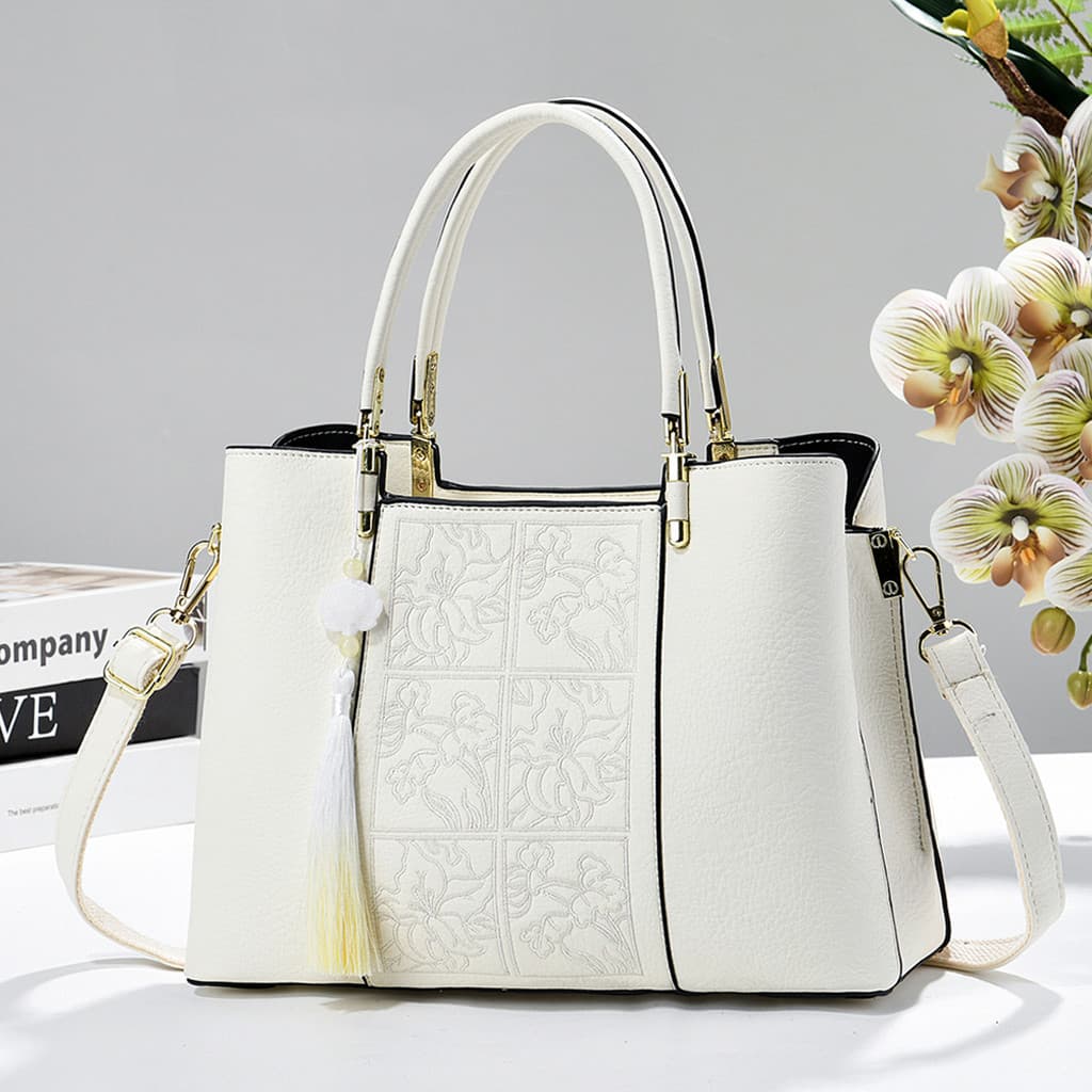 Novo chinês couro macio bordado bolsa feminina 2026 novo estilo luz luxo nicho High-End sentido dar mãe atmosférica bols