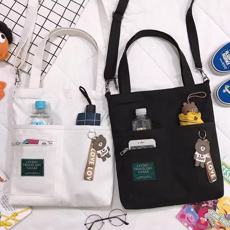 Bolsa mensageiro feminina estudante versão coreana bolsa de ombro de lona Campus bonito All-Match namoradas mesmo