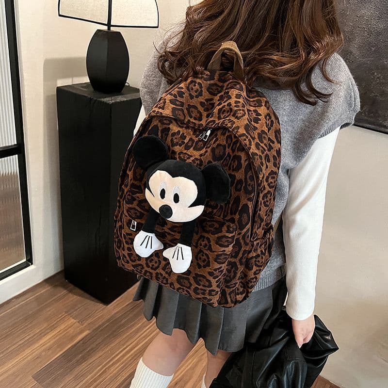 Commuter mochila de nicho de grande capacidade 2025 novo desenho animado Mickey bolsa escolar primária estampa de leopar