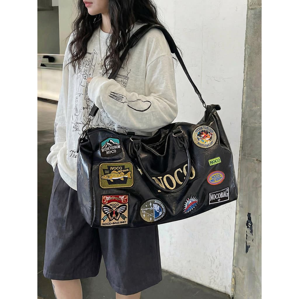 Bolsa de viagem de curta distância feminina 2026 novo estilo moda nicho Street Wear bolsa de grande capacidade masculino
