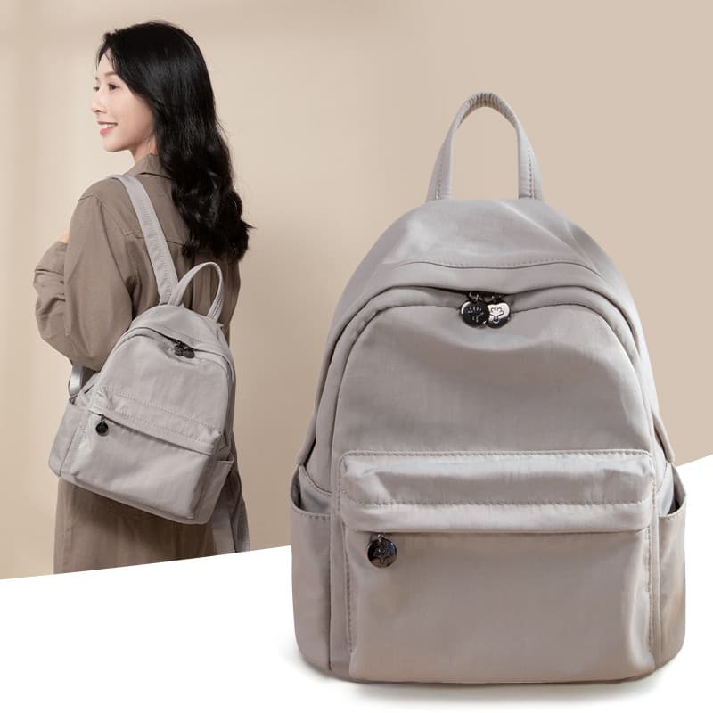 Mochila feminina 2026 novo estilo elegante All-Match leve Oxford pano pequena mochila trabalho Commuter mochila feminina