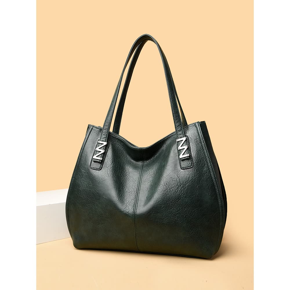 Bolsa Tote feminina de couro genuíno 2026 novo estilo Commuter All-Match bolsa mãe de meia-idade bolsa de ombro Fashion