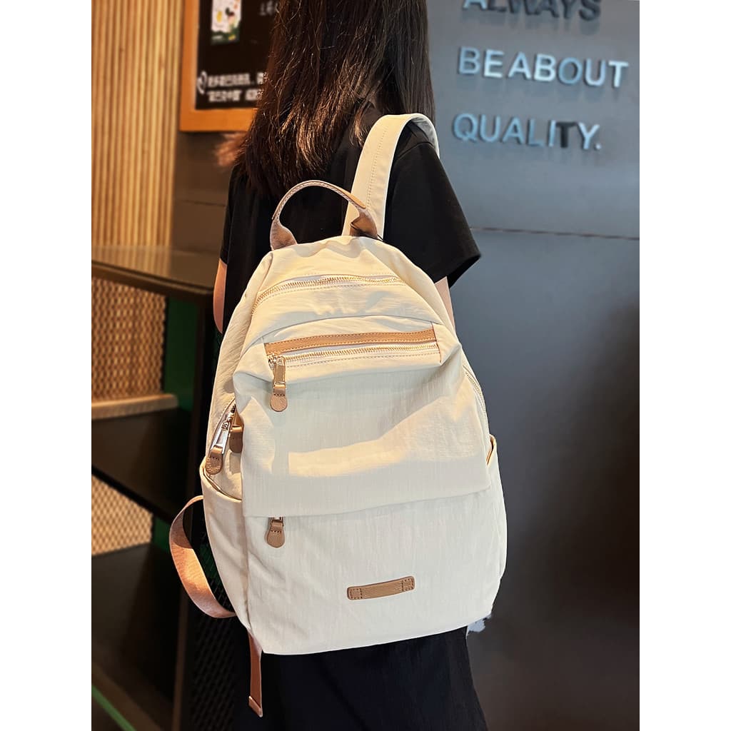 2026 novo estilo mochila feminina simples leve de grande capacidade à prova dwaterproof água Commuter mochila viagem All