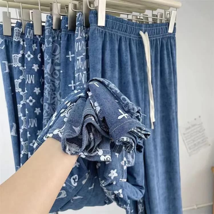Calças jeans de imitação de seda gelada com pernas largas femininas 2026 verão legal estampado calças casuais drapeadas