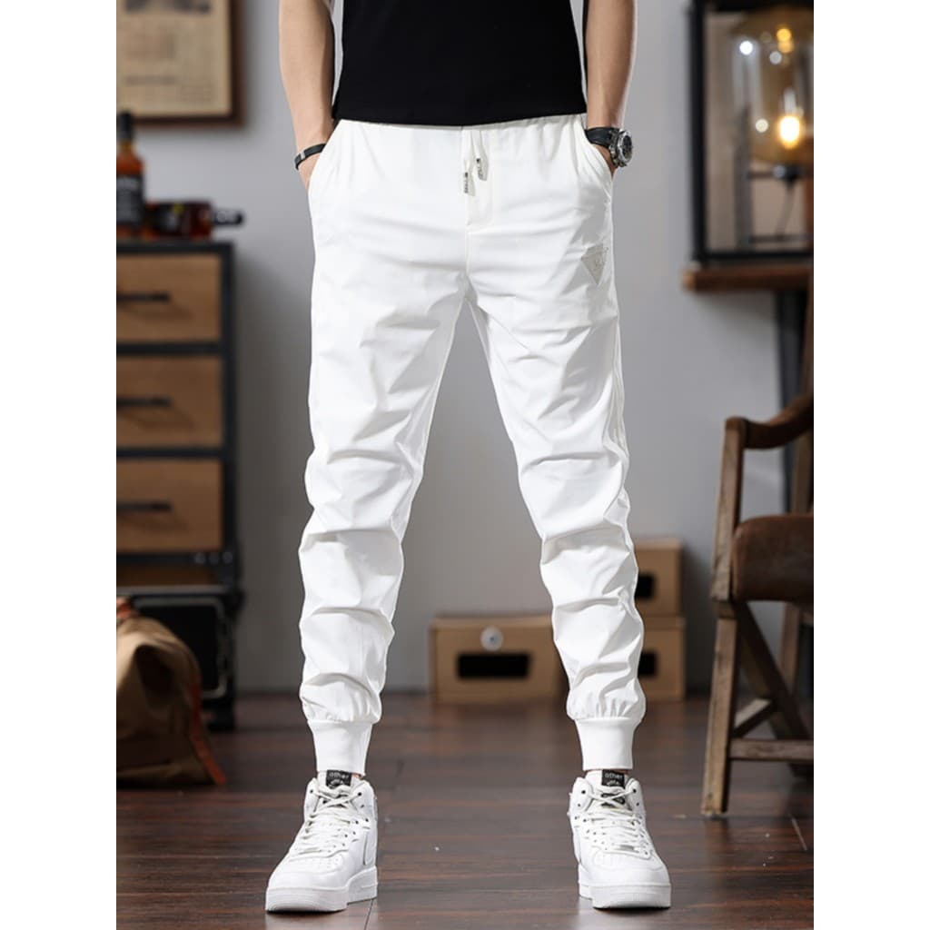 Verão gelo seda calças casuais masculinas finas elásticas calças de ajuste fino masculino Street Wear All-match calças e