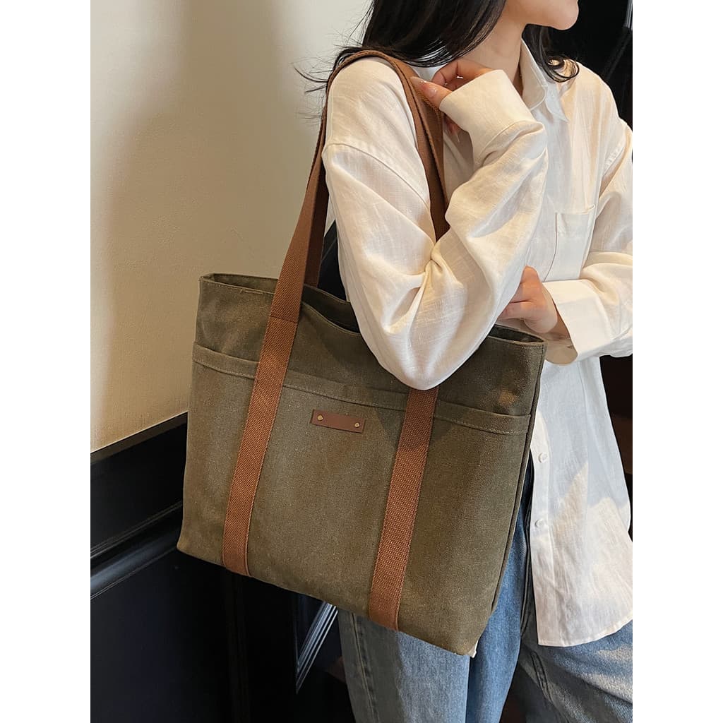 Commuter sacola feminina 2025 novo estilo bolsa de grande capacidade Casual All-Match grande saco simples lona bolsa de