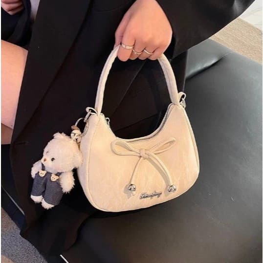 Bolsa de mão feminina coreana em couro aveludado, formato oval, com um ursinho de pelúcia pendurado com um laço - para e