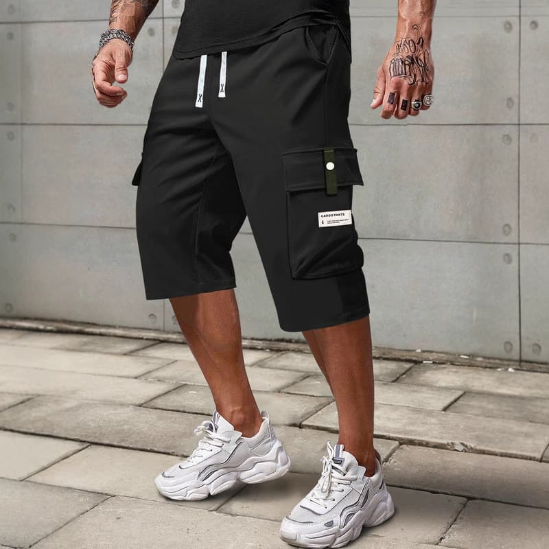 Novo tamanho europeu transfronteiriço fino em linha reta calças cortadas dos homens verão macacão Shorts soltos meninos